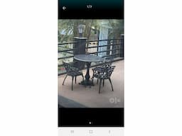 Cast iron table and chairs - Image 2