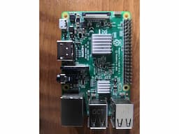 Raspberry Pi 3 Model B, with clear case, heatsink and 2.5 A adapter - Image 1