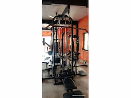 Cable machine and dumb bells - Image 1