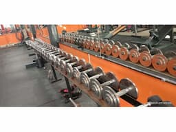 Cable machine and dumb bells - Image 2