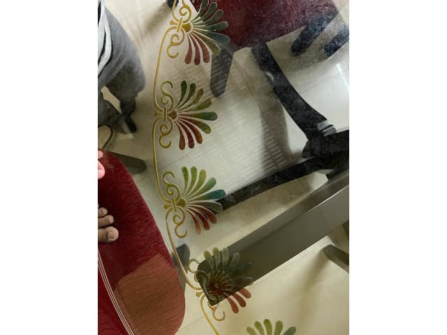 Delicately used 8 seater dining table with chairs in very good condition