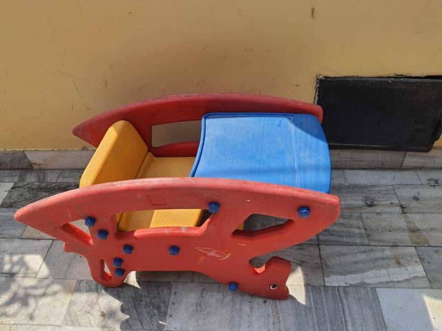 Rocking chair cum table chair