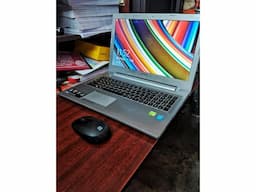Laptop with new battery and wireless mouse. - Image 1